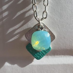 Colgante piel+swarovski+plata en turquesa