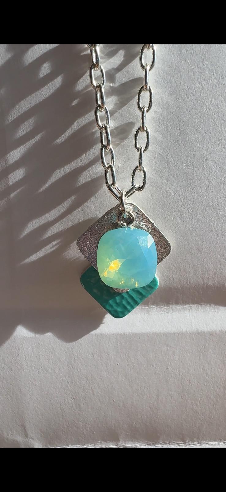 Colgante piel+swarovski+plata en turquesa