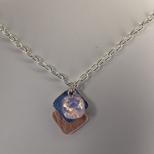 Collar de piel + Swarovski + plata en rosa